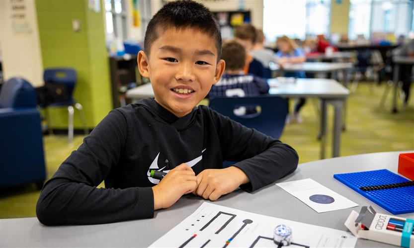 Students use robots in library